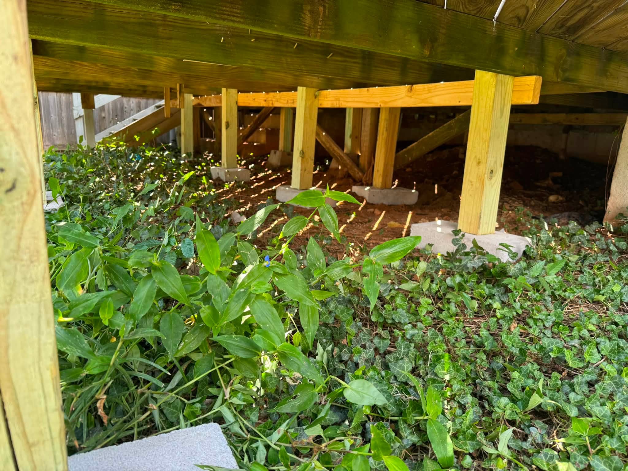 Deck joists and posts on concrete pier blocks