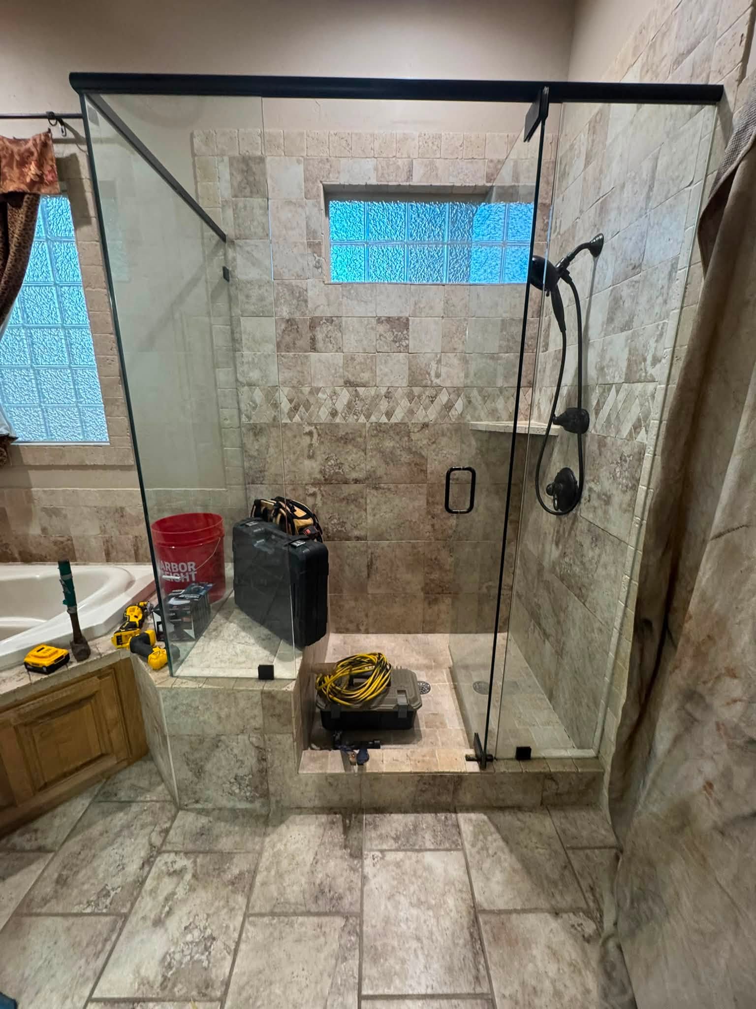 Finished tiled shower after framing and drywall work
