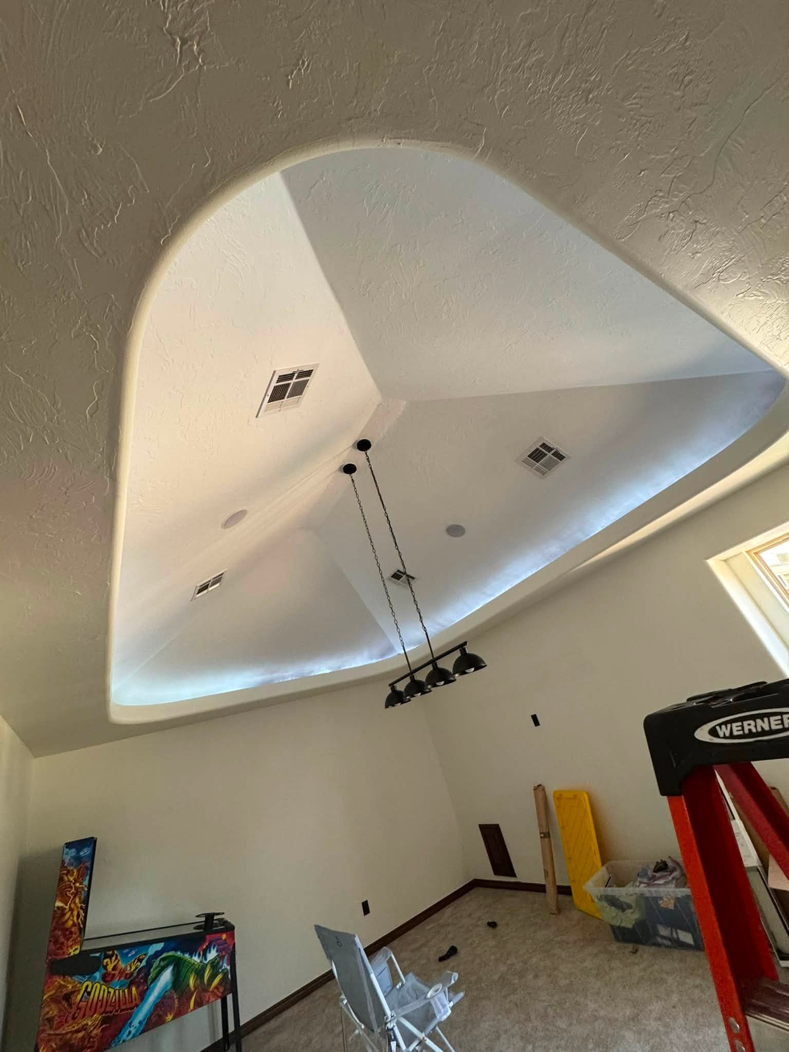 Pendant lighting installed in a custom recessed ceiling
