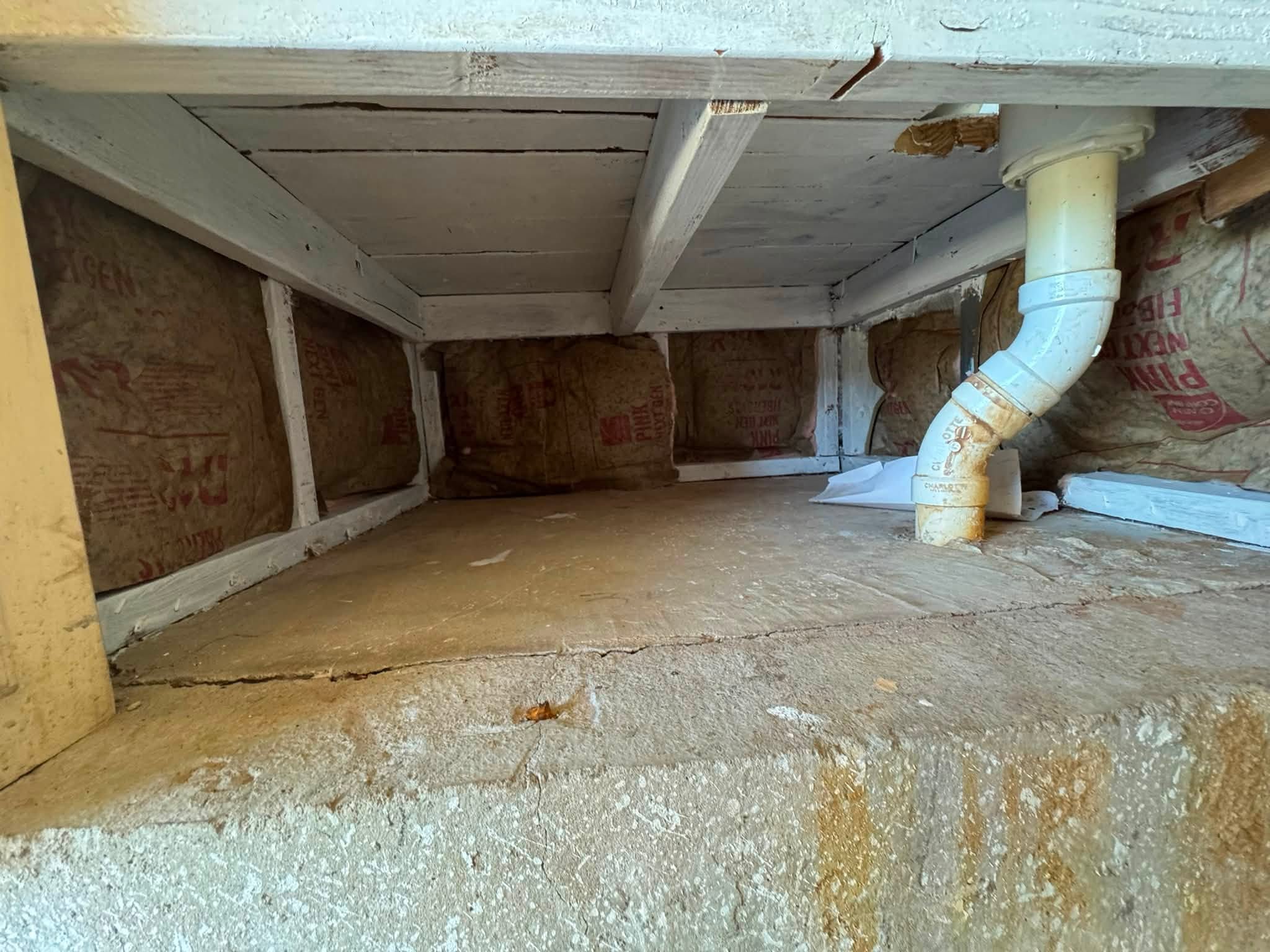 Insulation and venting work in a home utility space